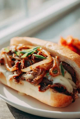 Bulgogi Cheesesteak auf dem Blech mit karamellisierten Zwiebeln